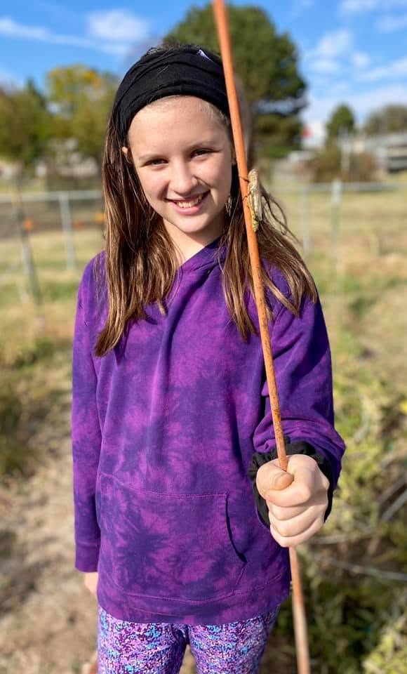 Green Thumb Initiative participant exploring nature during a garden program