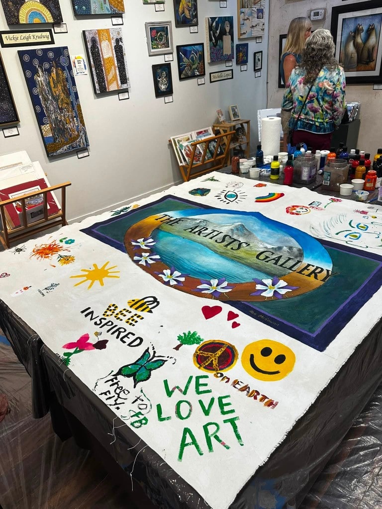 Collaborative community art Green Thumb Initiative collaborative art banner at The Artists Gallery